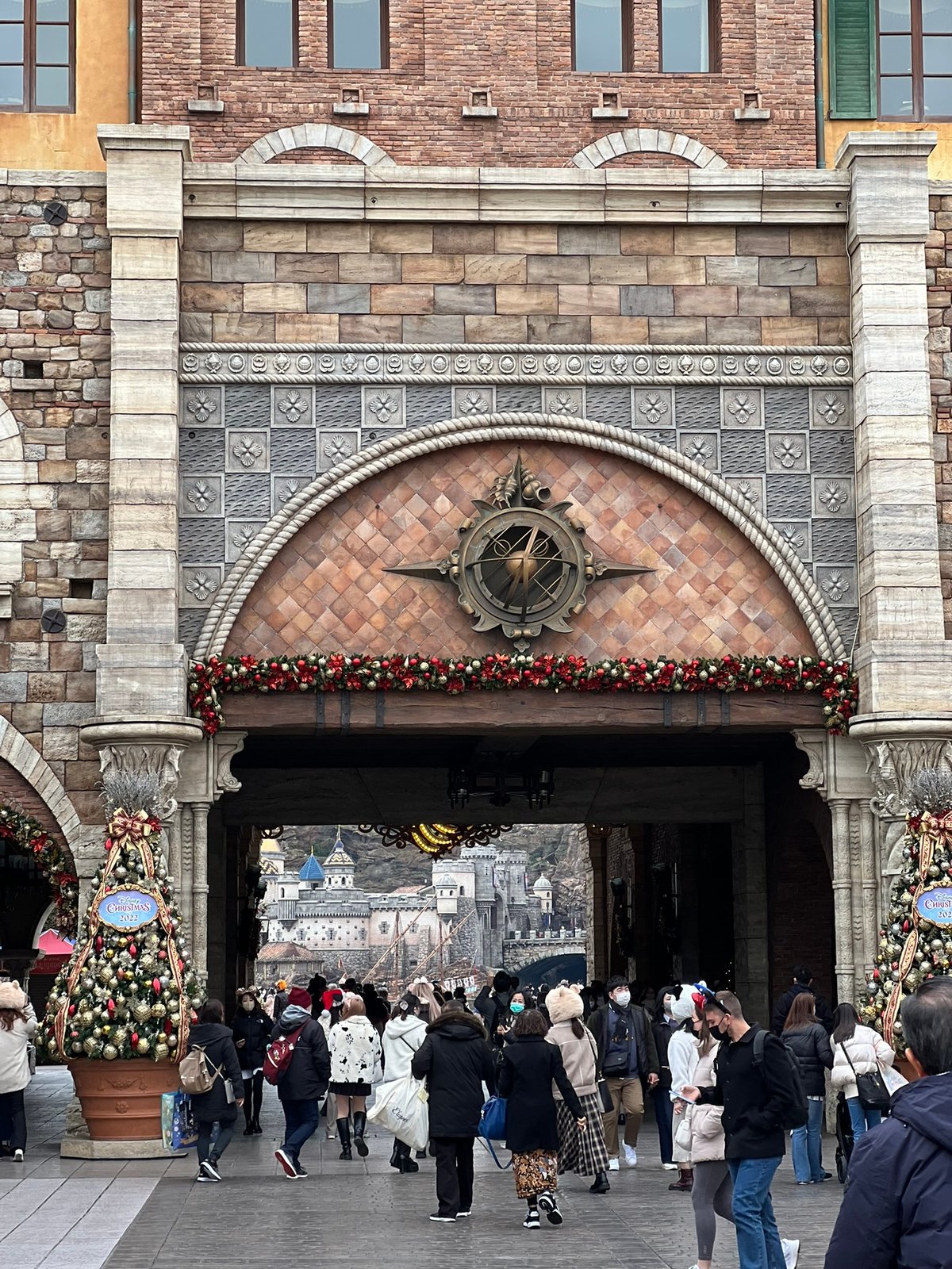 Grand stone entrance portico with a nautical medallion