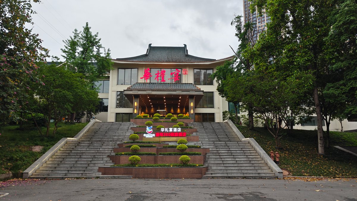 Grand traditional-roofed building at the top of the