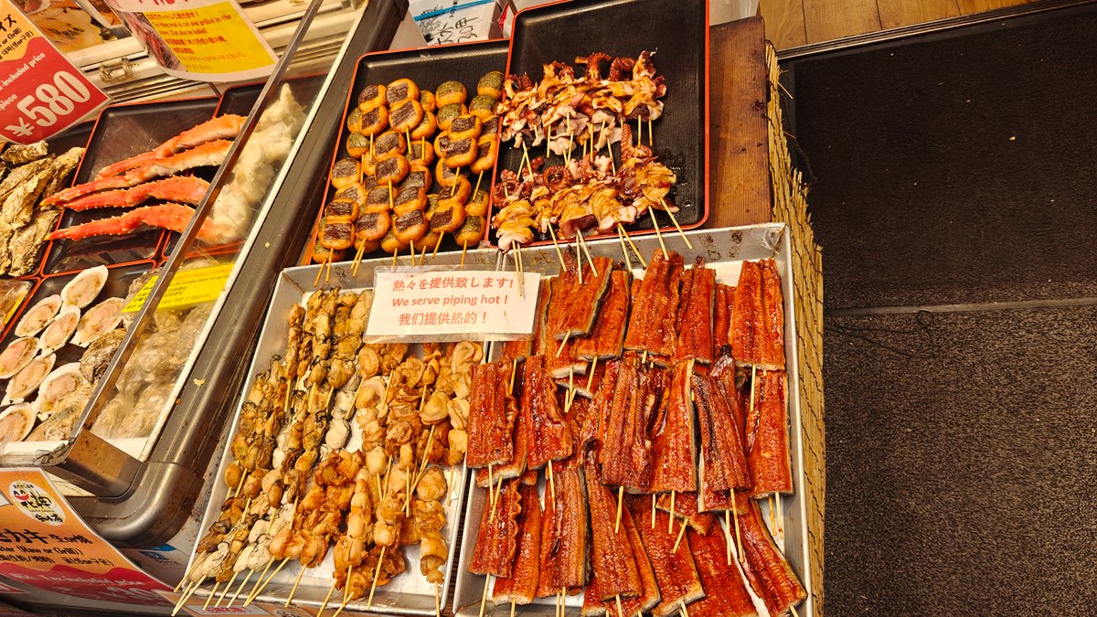 Grilled skewers display — unagi eel on sticks,