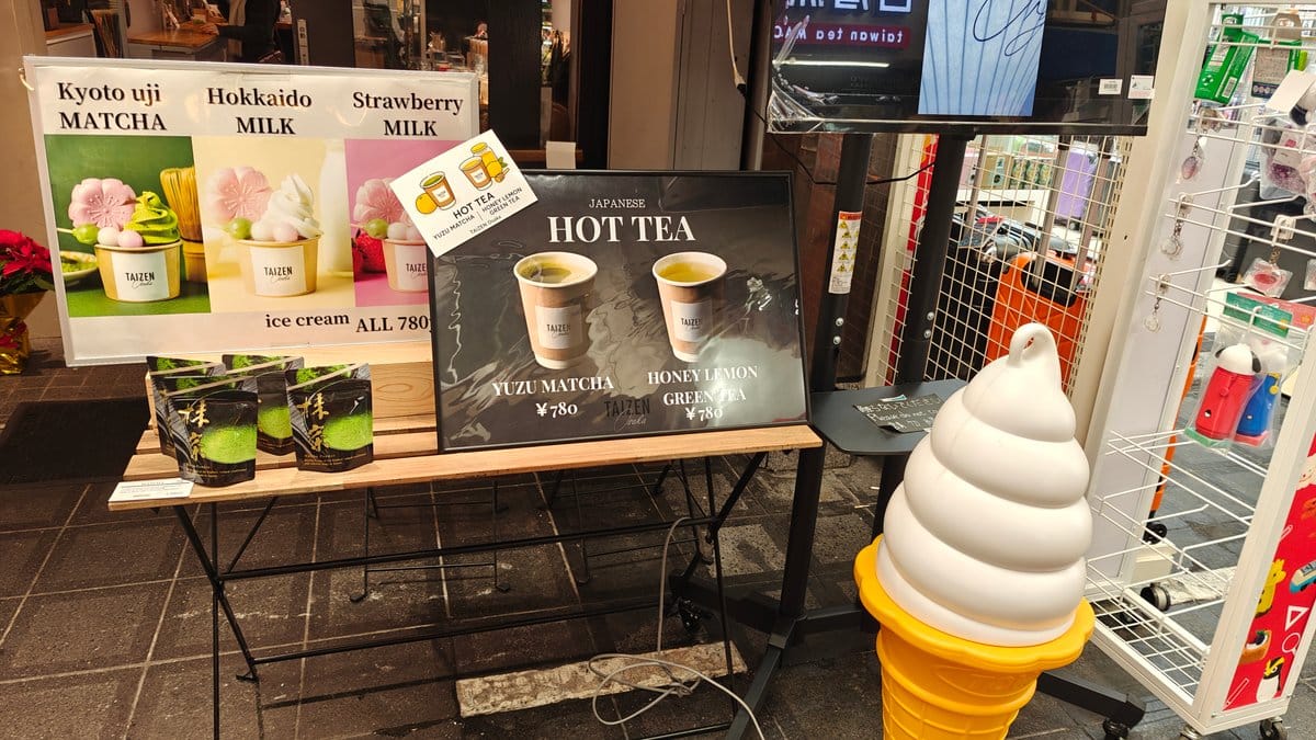 Ice cream and hot tea stand outside shop