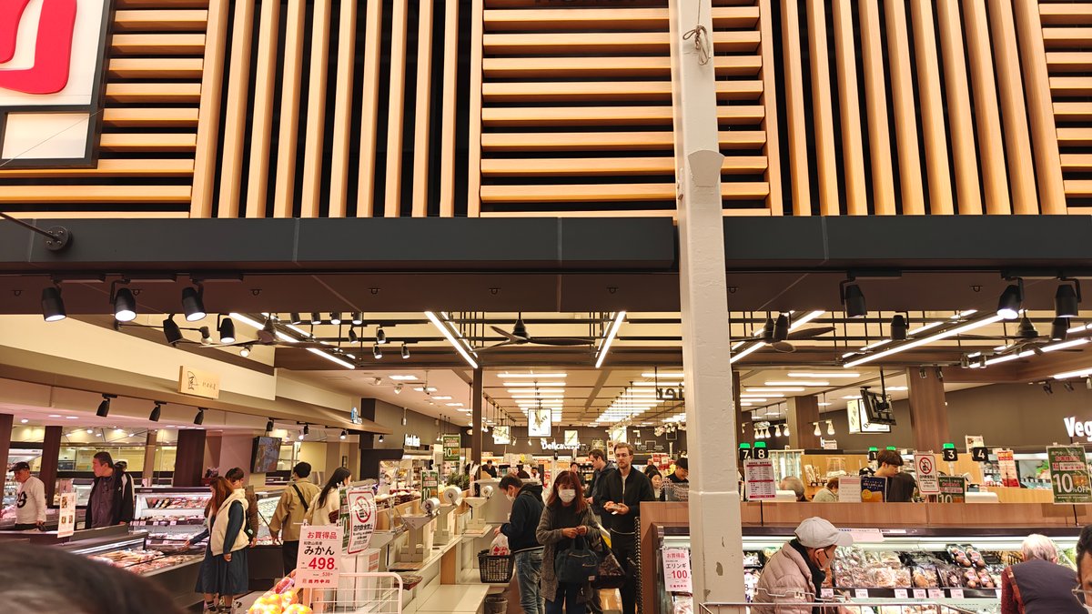 Inside Kuromon Nakagawa — modern supermarket interior with