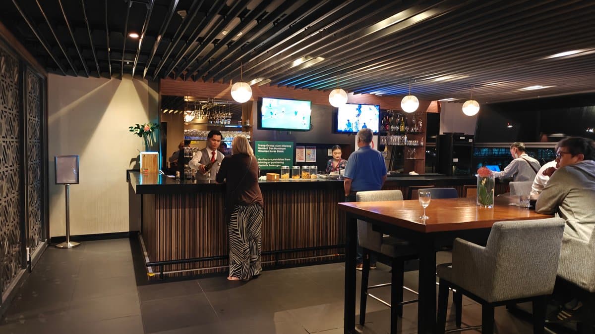 Lounge bar with bartender serving