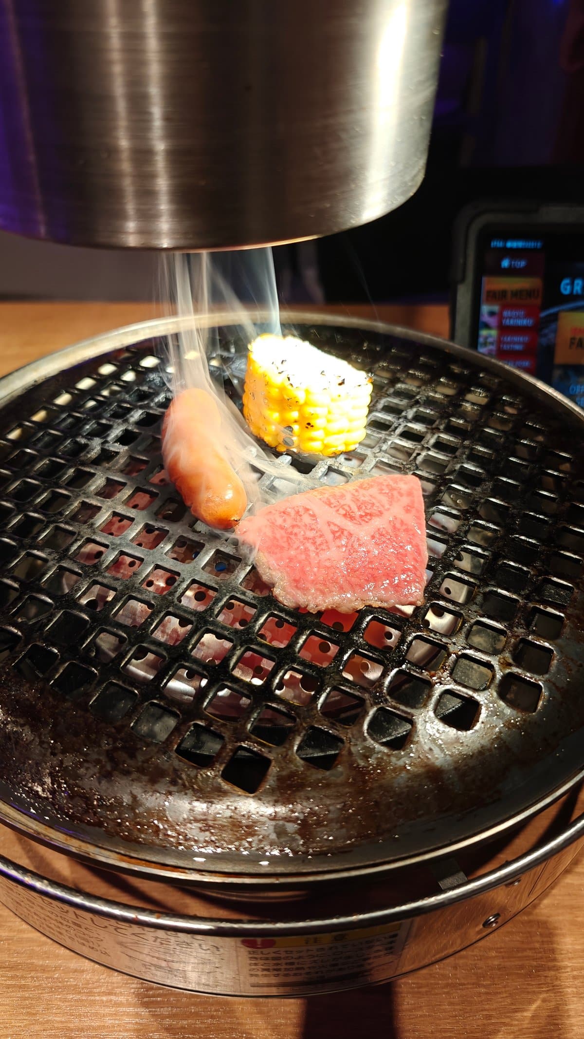 Marbled wagyu on charcoal grill