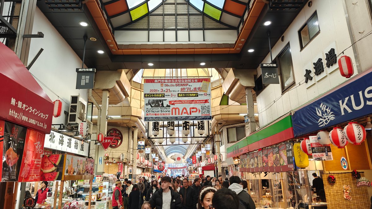 Market corridor intersection with colorful stained glass ceiling,