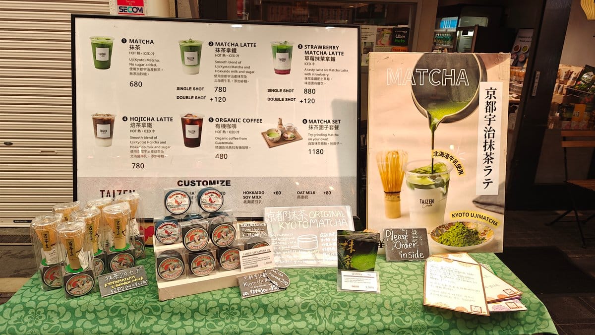 Matcha drinks stand with menu board — matcha,