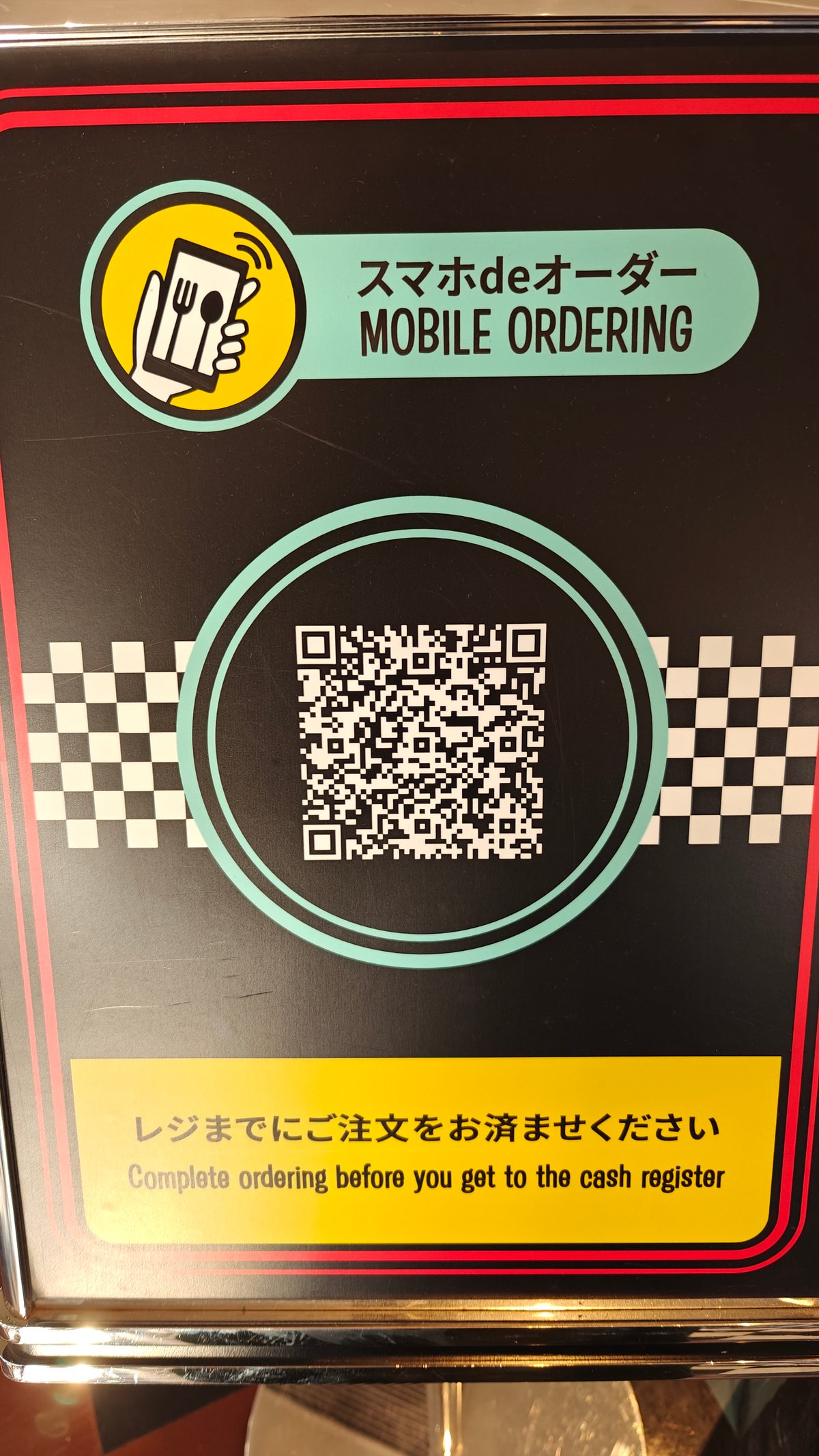 Mobile ordering QR code sign in Mel's checkered