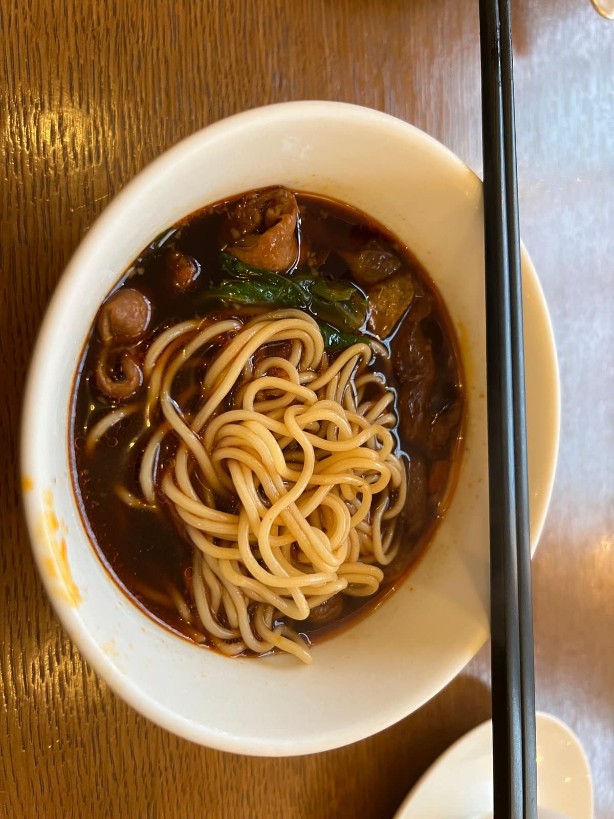Noodles in dark braised broth