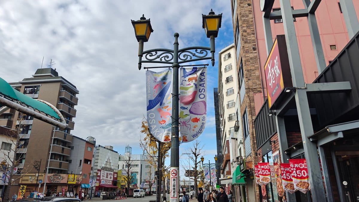 Osaka street scene with aquarium advertising banners on
