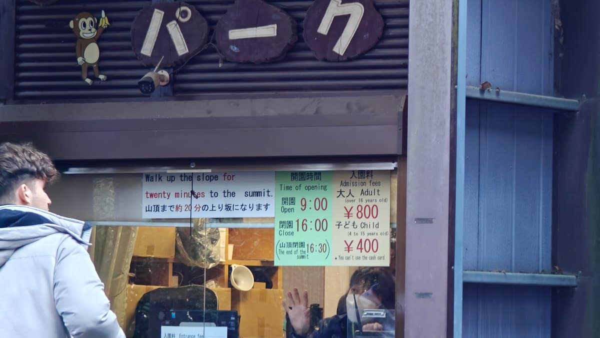 'PARK' ticket window with posted admission prices