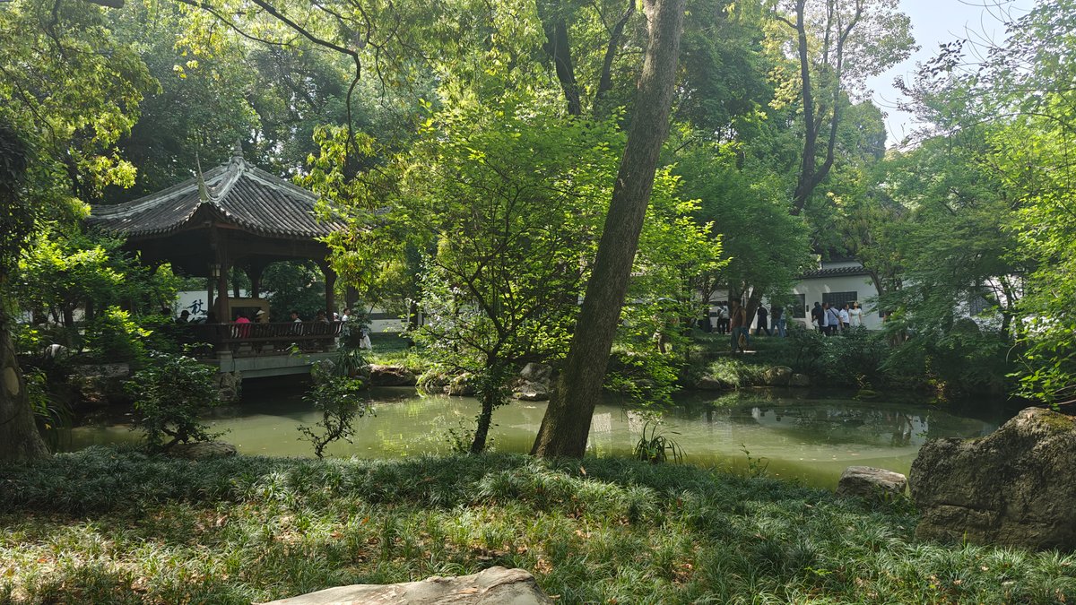 Pavilion beside green pond
