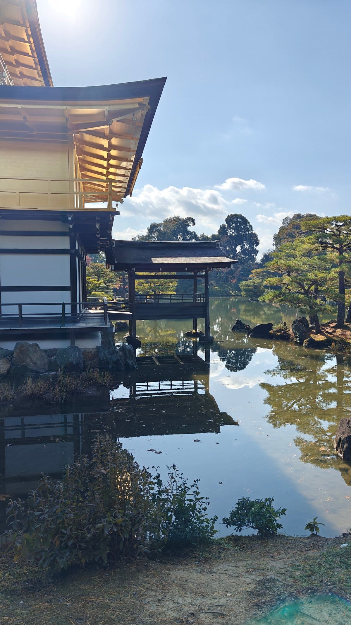 Pavilion corner reflected in pond