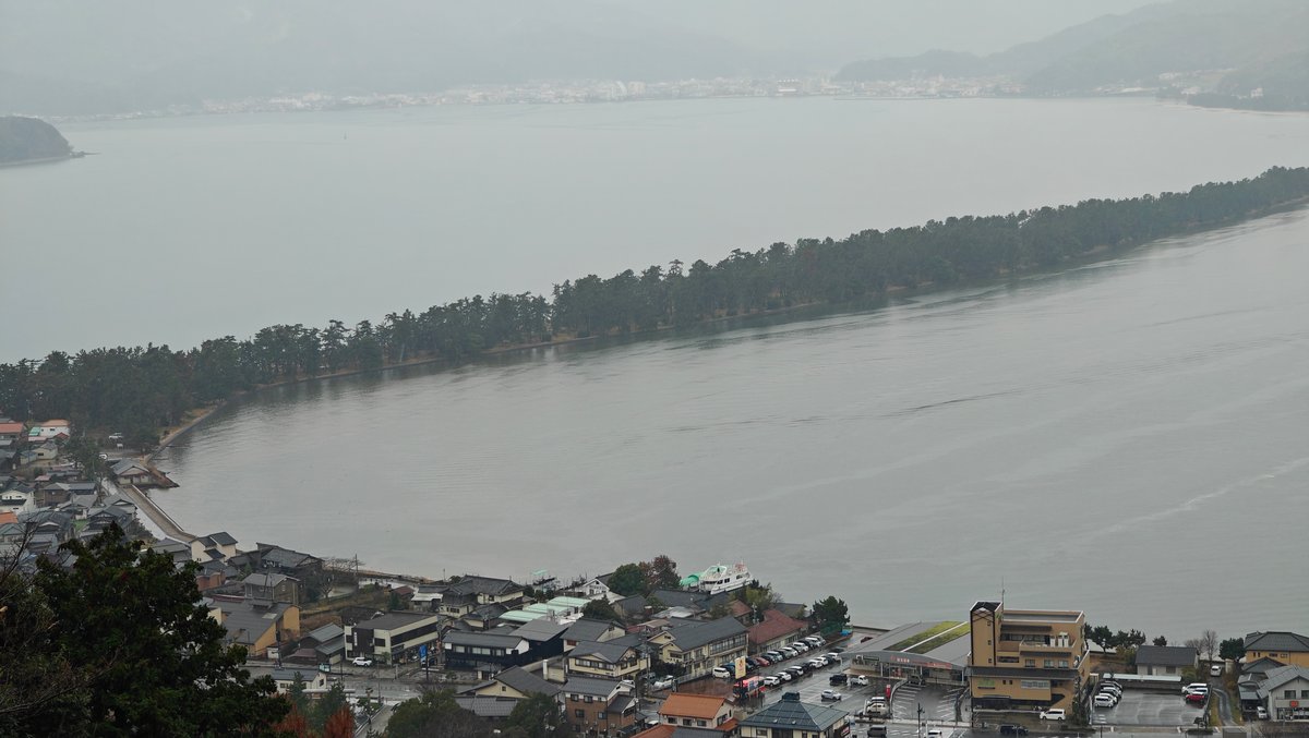 Pine sandbar panorama across bay