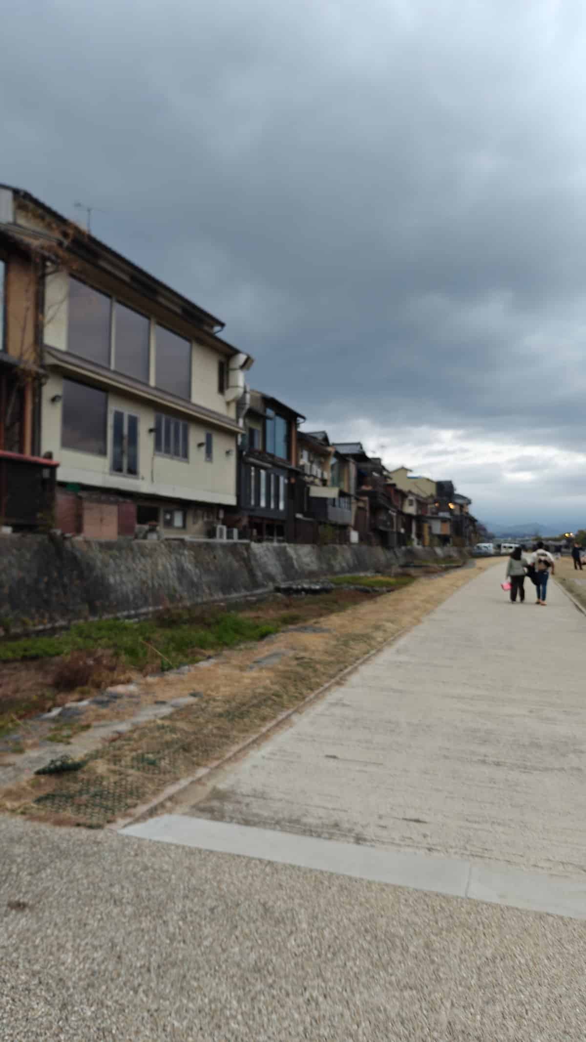 Riverside buildings lining the walking path