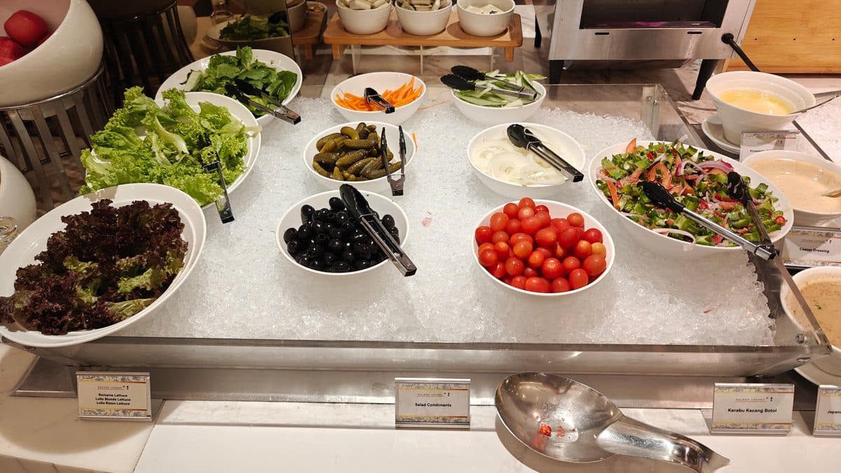 Salad bar with lettuce varieties labeled