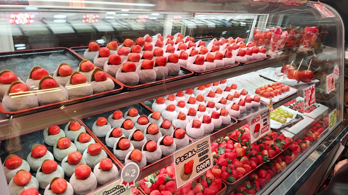 Strawberry dessert display case — mochi-wrapped strawberries, chocolate