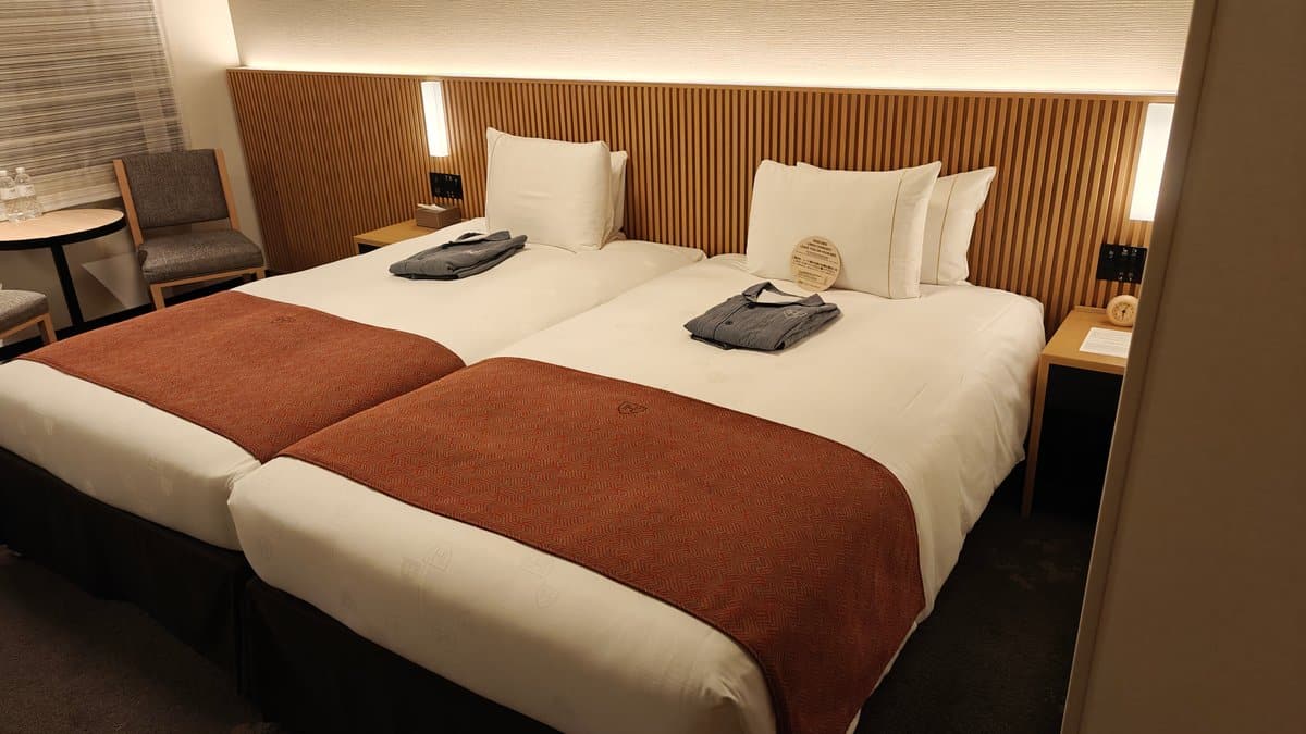 Twin beds red runner room