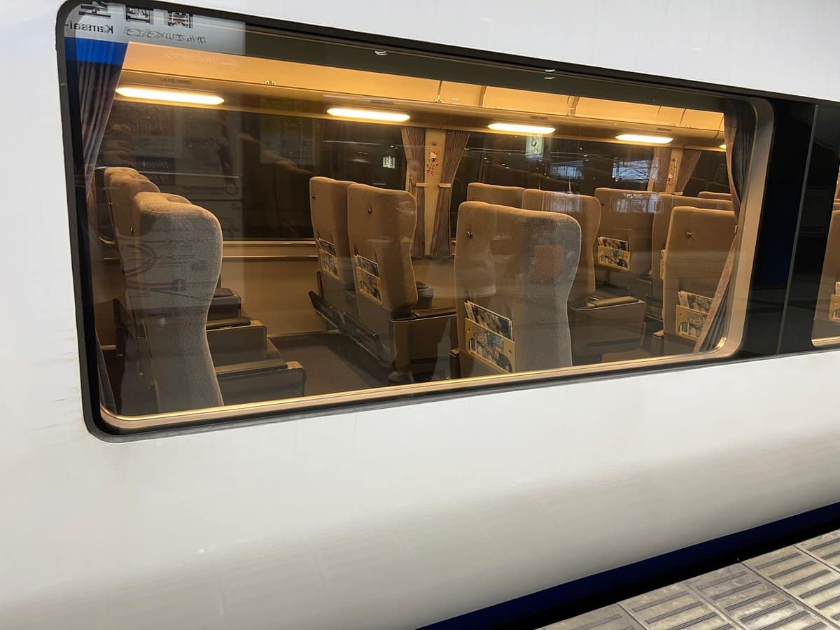 View through the carriage window with the seats