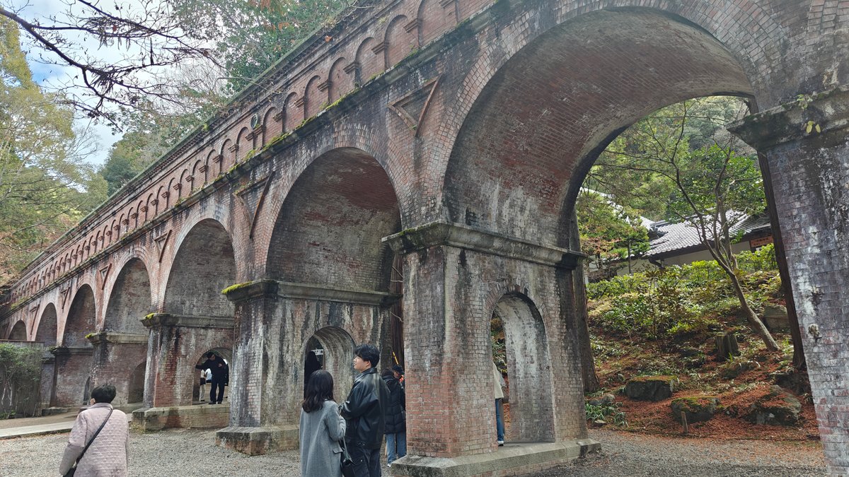 Walking beneath aqueduct arches