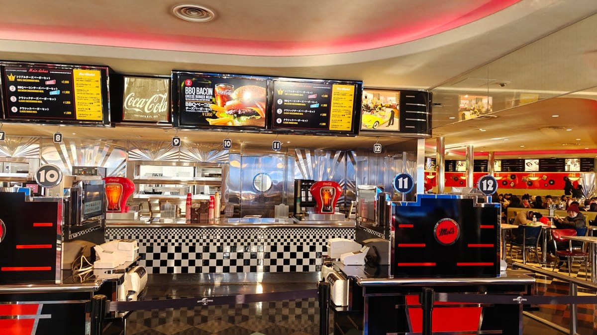 Wide view of ordering counter with menu screens,