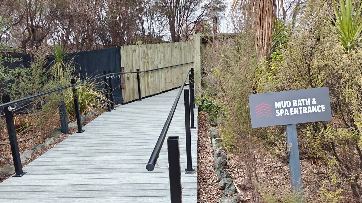 A boardwalk leading to the spa with a