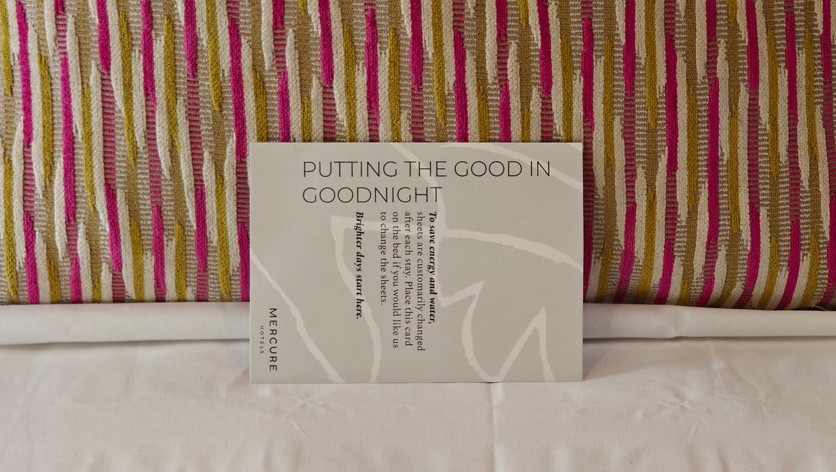A card reading PUTTING THE GOOD IN GOODNIGHT