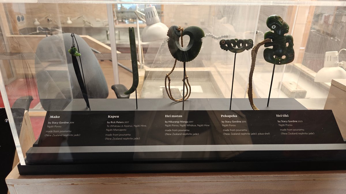 A case of carved pendants — hei tiki