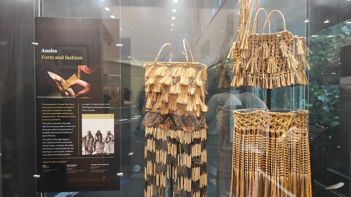 A case with woven kete and a piupiu