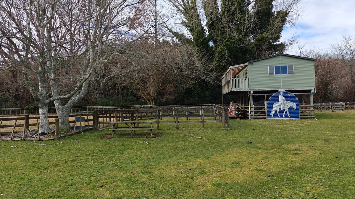 A farm shed with a painted mural and