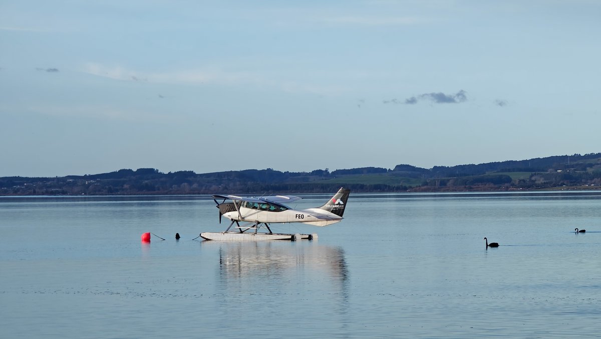 A floatplane resting on the lake surface.