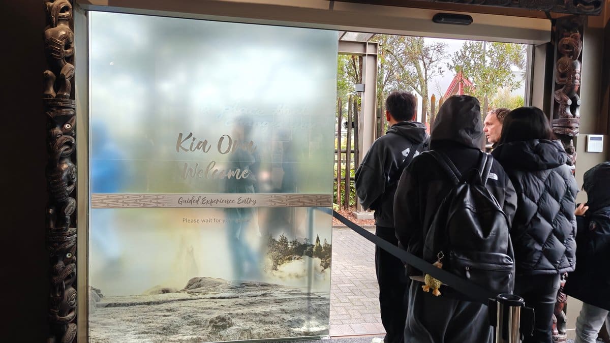 A glass display panel etched with Kia Ora