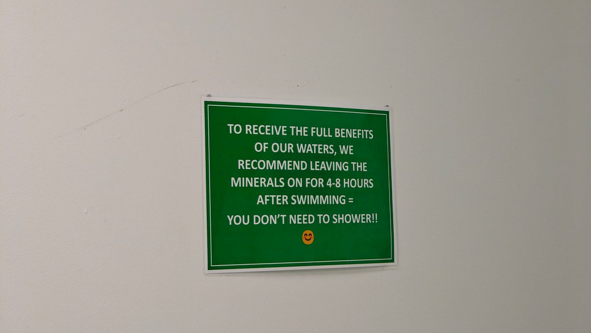 A green sign advising that to receive the