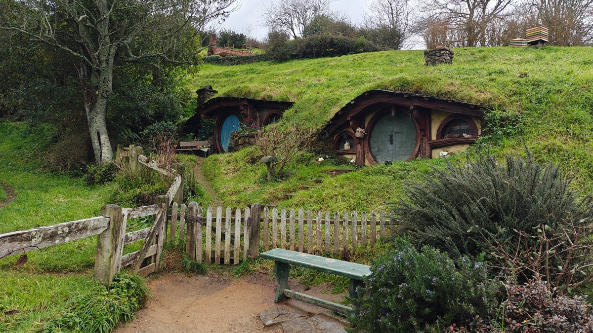 A hobbit hole with a blue door, a