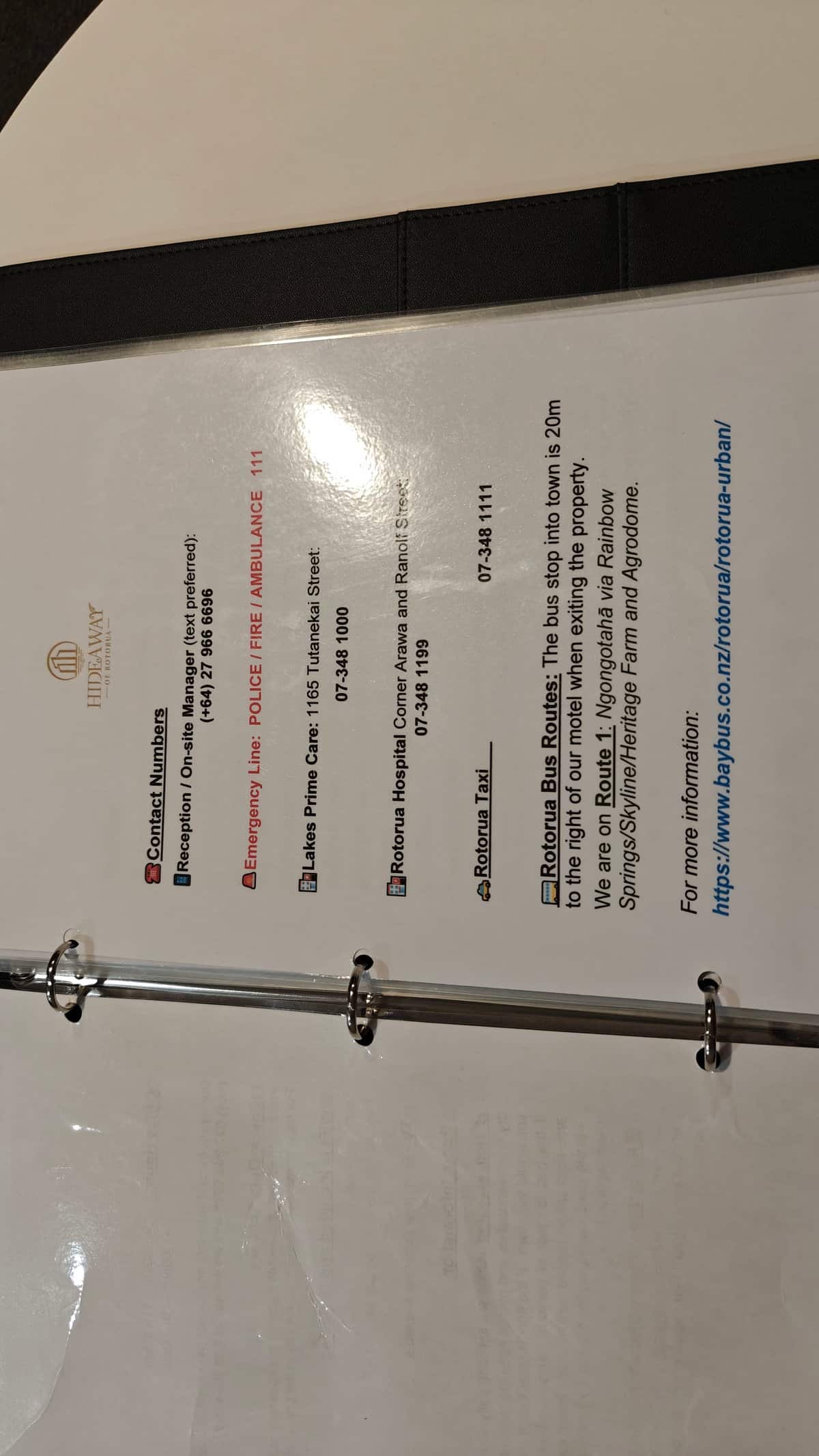 A laminated information sheet mounted on the wall.