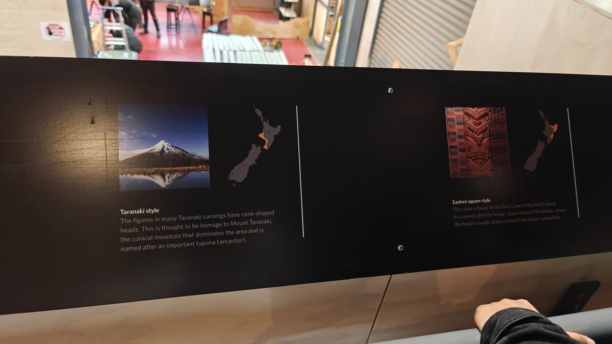 A panel with pounamu pieces displayed against a