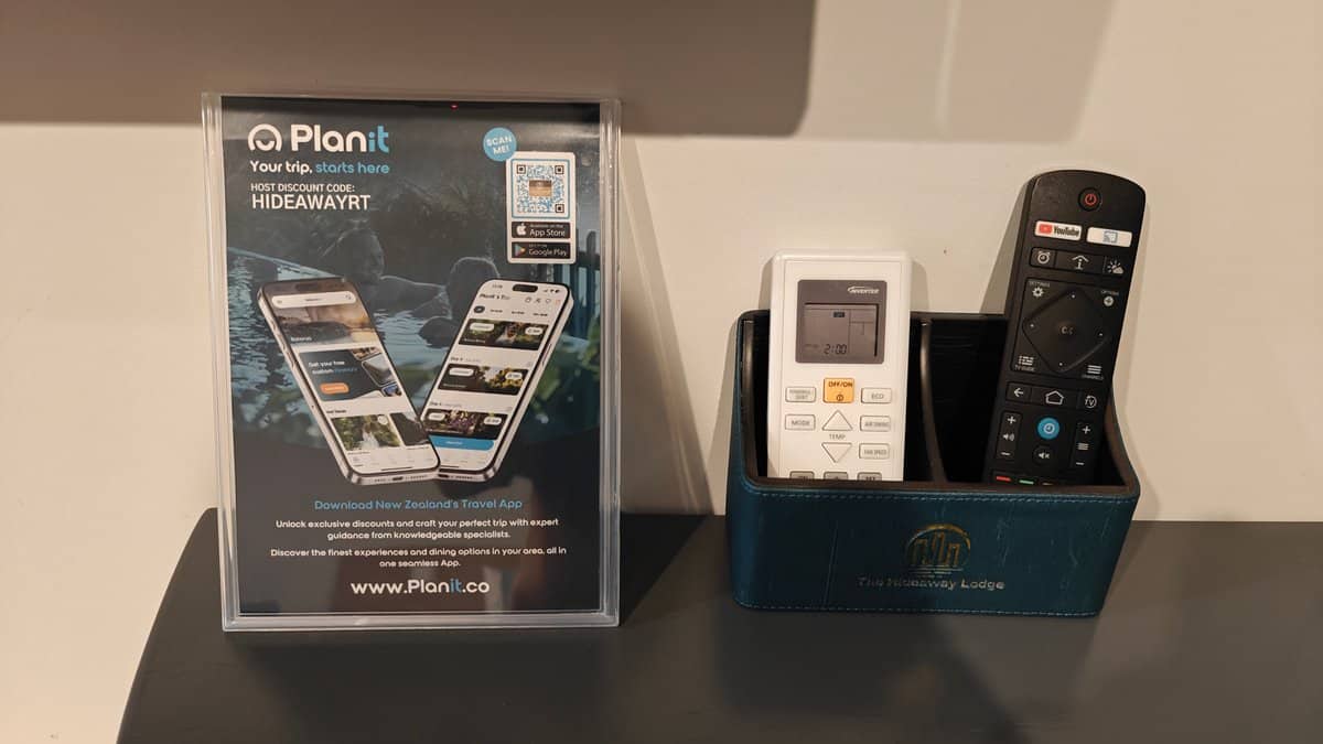 A Planit tablet stand and the television remotes