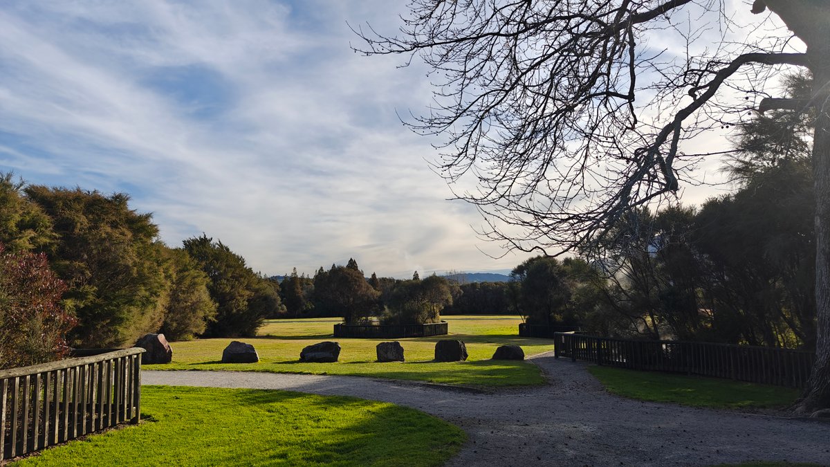 A row of low green covered mounds set