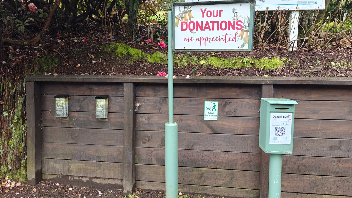 A sign reading Your DONATIONS are appreciated above