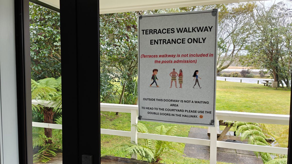 A TERRACES WALKWAY ENTRANCE ONLY sign beside the