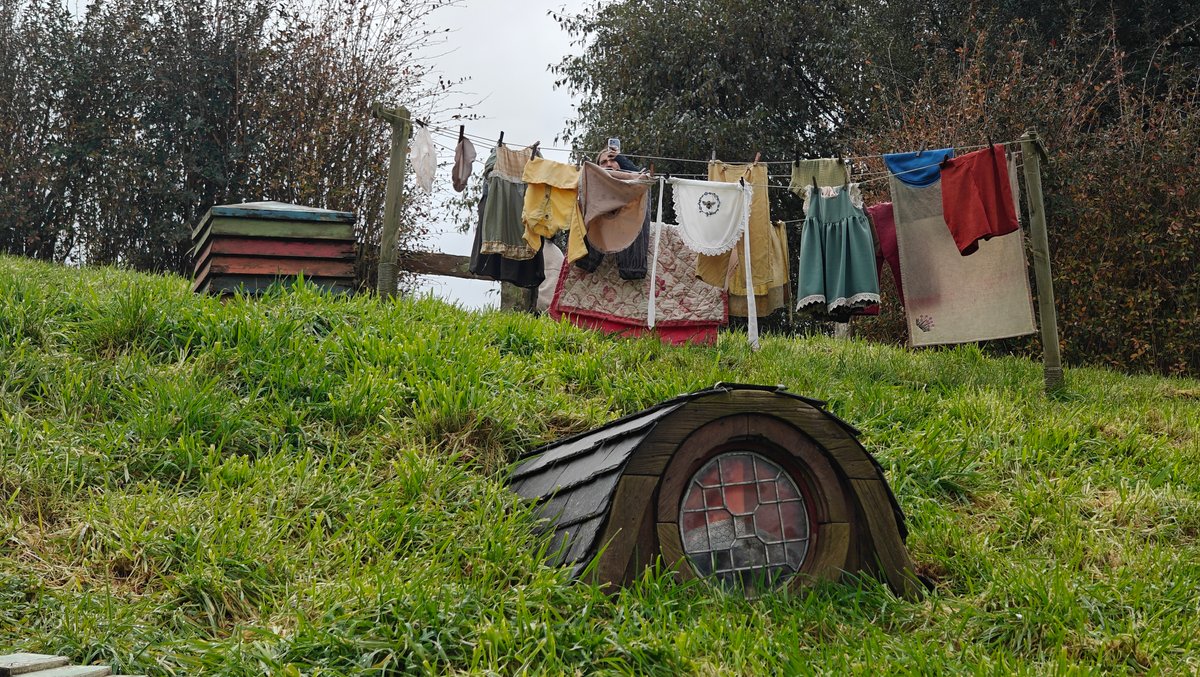 A washing line strung with clothes above a