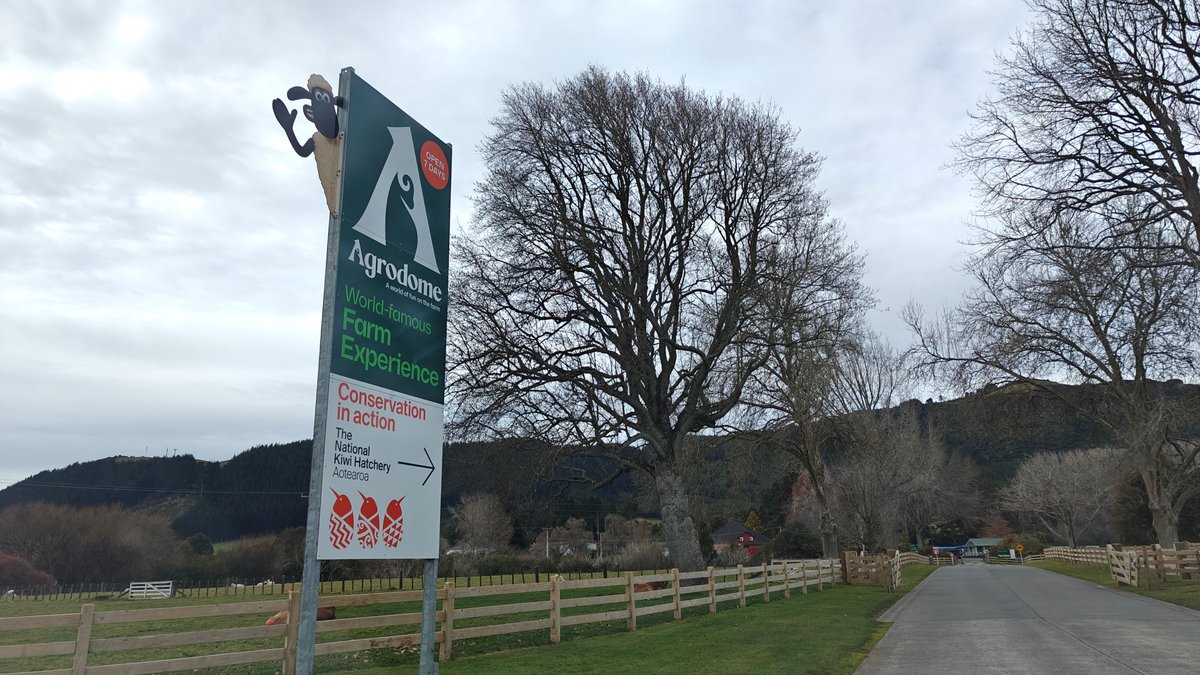 An Agrodome roadside sign beside the drive with