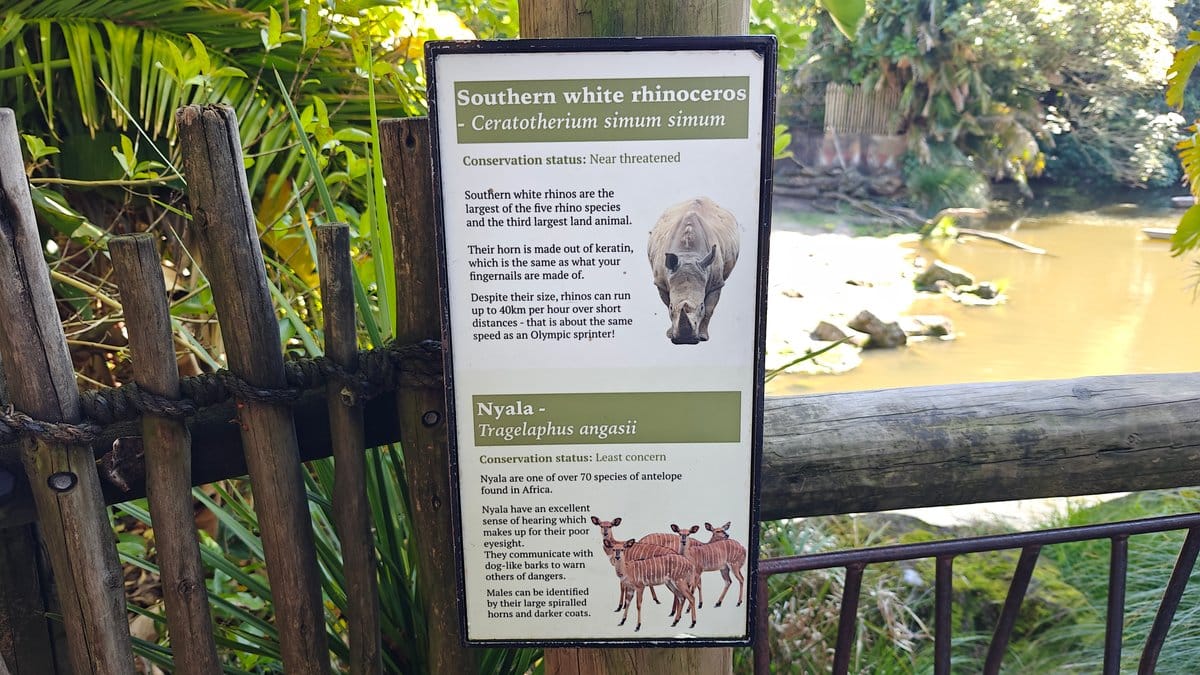 An interpretive panel on the fence for the