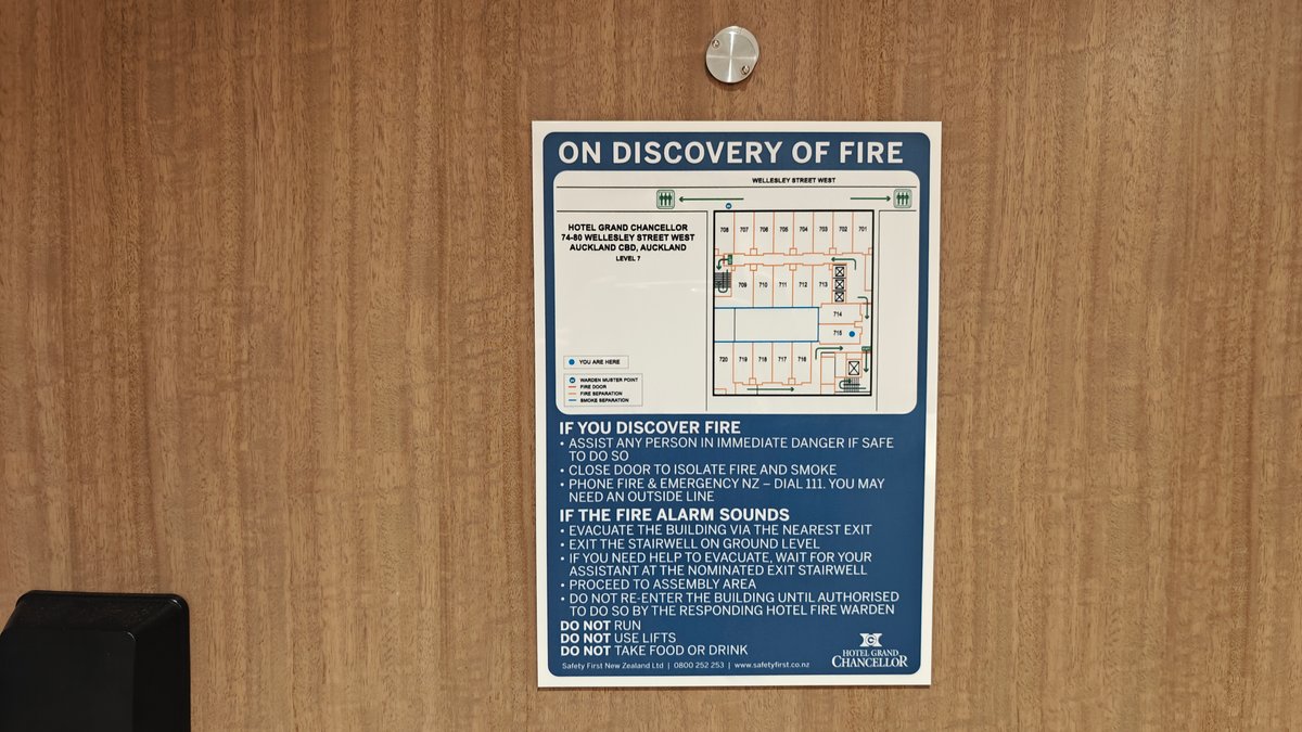 An ON DISCOVERY OF FIRE notice mounted inside