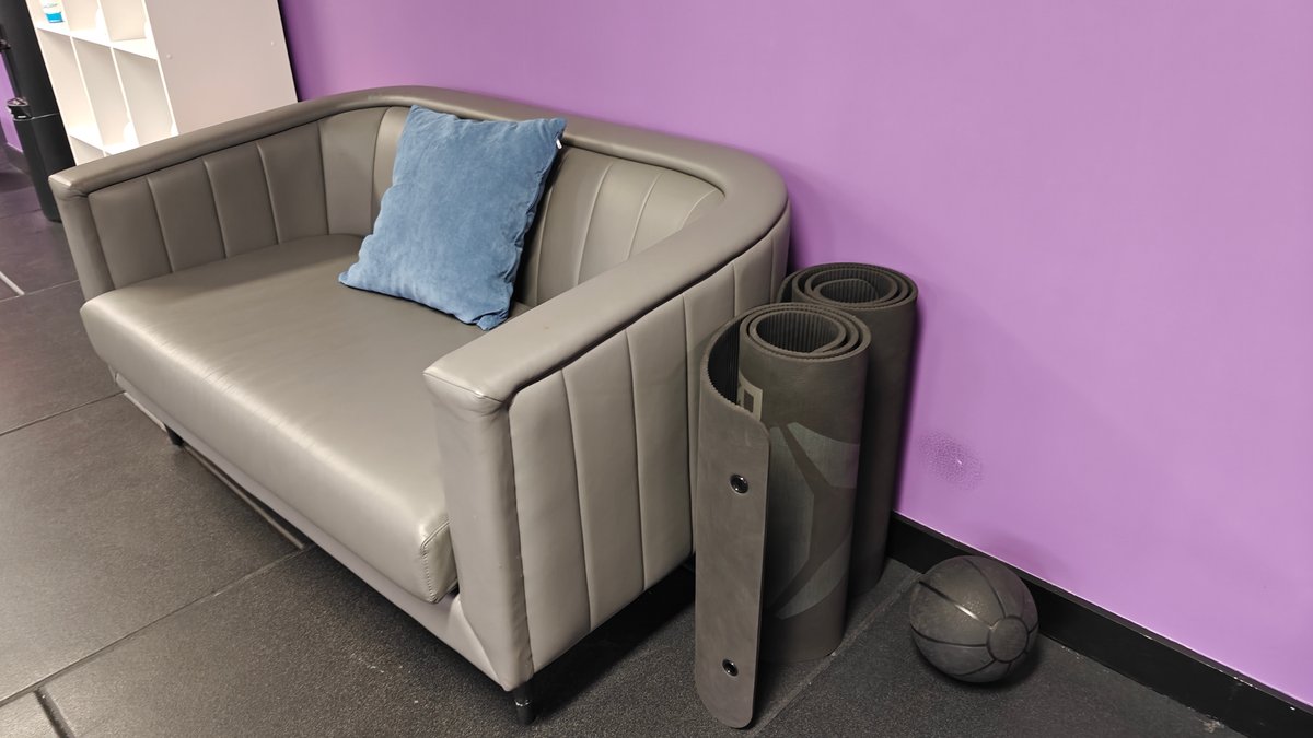 Armchair with foam rollers nearby