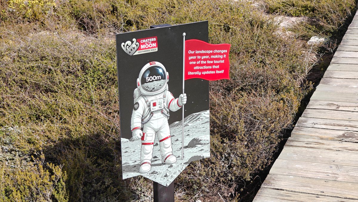 Astronaut graphic beside the boardwalk