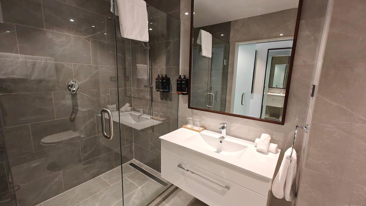 Bathroom shower and wall-hung vanity