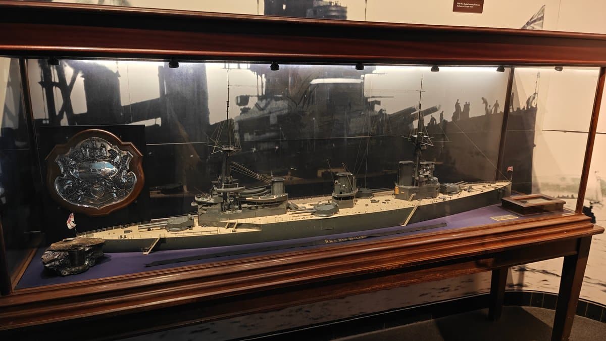 Battlecruiser model in a glass case