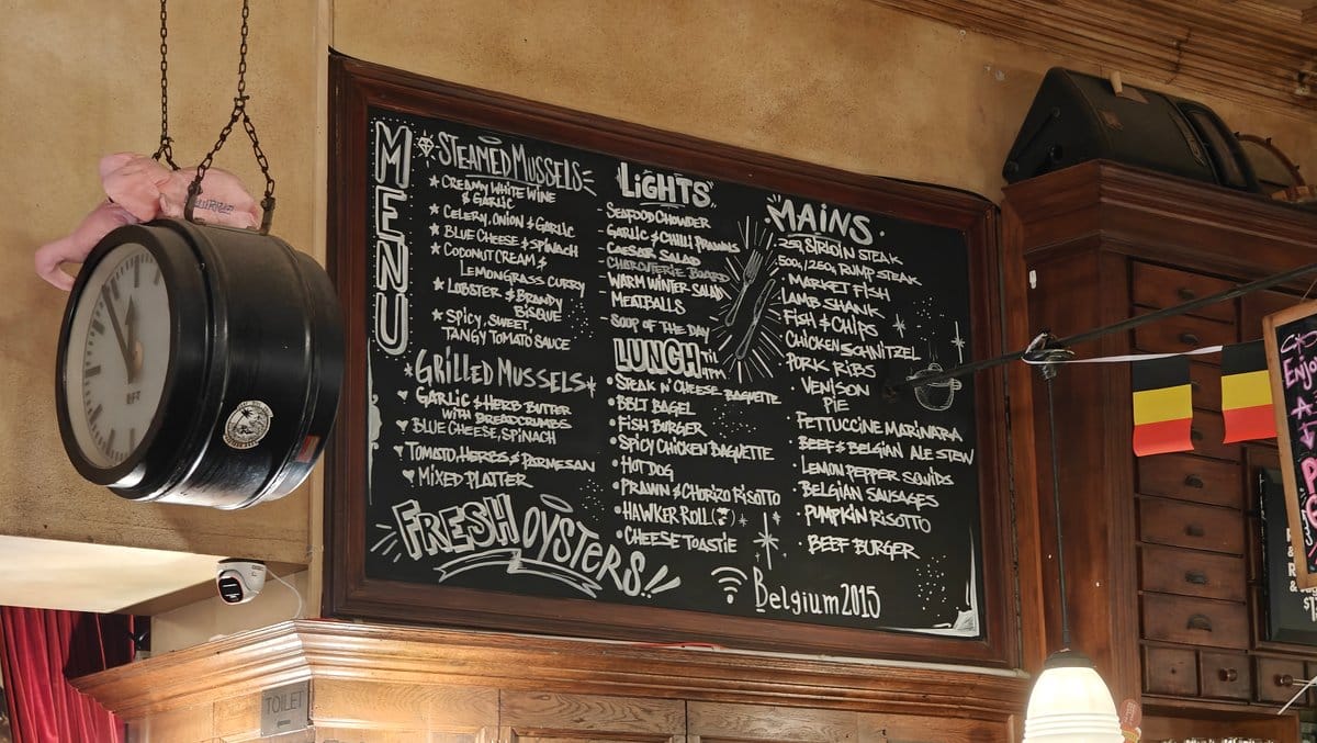 Belgian pub interior with chalkboards