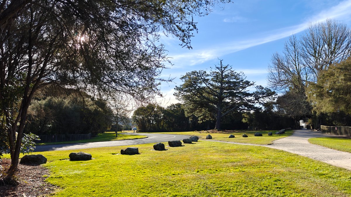 Boulders set in mown parkland