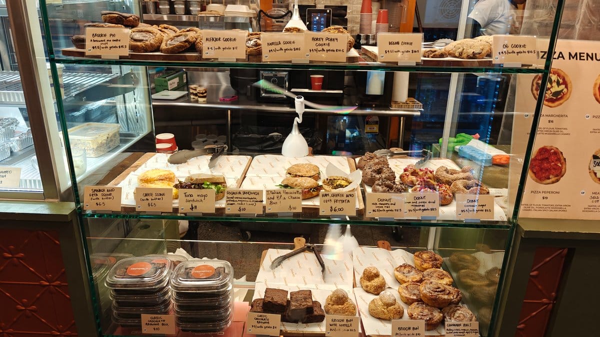 Cakes and pastries under glass