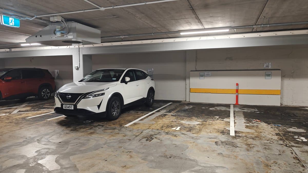 Cars parked in the basement bays under the